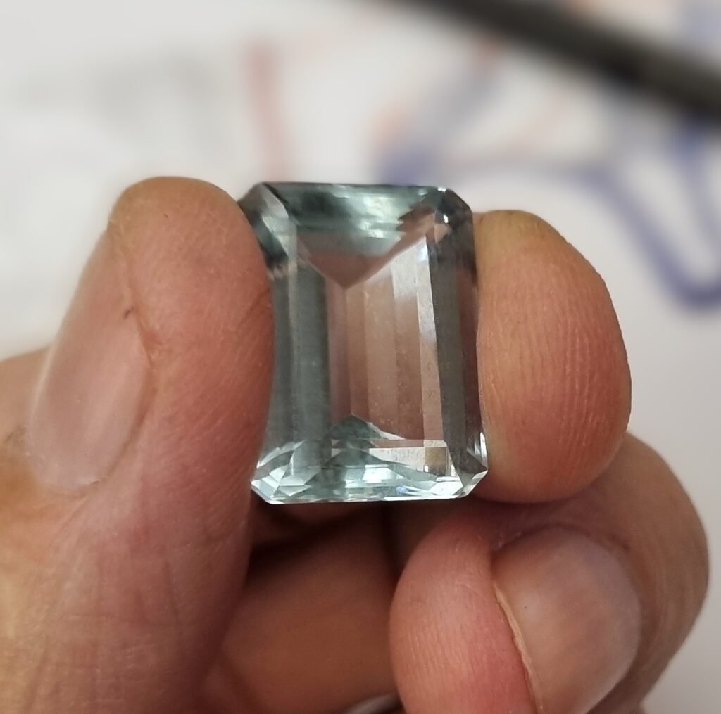 A faceted light blue Brazilian aquamarine