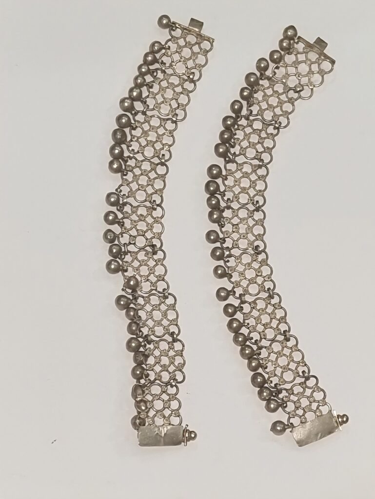 A pair of heavy traditional Dogri silver payal (anklets)